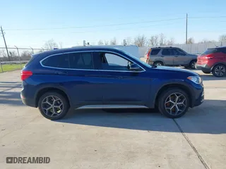 2019 BMW X1 sDrive28i with VIN WBXHU7C54K5L11298, listed as a IAAI auction lot 41662155 with 36,753 mi miles. Bid and sale history available at carsss.com. Image 13.