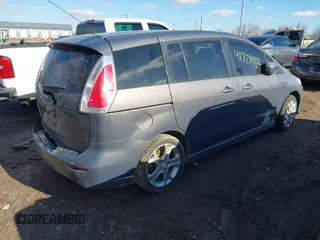 2010 Mazda 5 Sport z VIN JM1CR2W39A0379291, wystawiony jako IAAI lot #41728402 z przebiegiem 159 804 mil mil oraz . Historia ofert i sprzedaży dostępna na DreamBid. Obrazek 4.