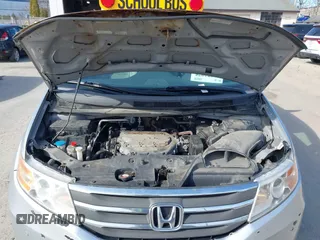 2012 Honda Odyssey Touring with VIN 5FNRL5H95CB063003, listed as a IAAI auction lot 41871975 with 179,332 mi miles and . Bid and sale history available at DreamBid. Image 10.
