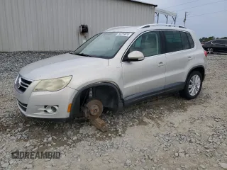 2010 Volkswagen Tiguan SEL with VIN WVGAV7AXXAW518007, listed as a Copart auction lot 56293635 with 117,800 mi miles and Salvage title. Bid and sale history available at DreamBid. Image 1.