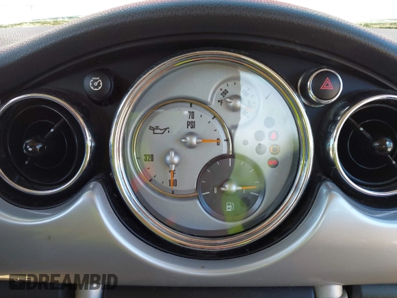 2006 MINI Hardtop S with VIN WMWRE33526TG99561, listed as a IAAI auction lot 42230639 with 202,113 mi miles and . Bid and sale history available at DreamBid. Image 12.