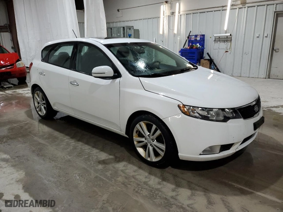 2011 Kia Forte 5-Door SX with VIN KNAFW5A38B5434748, listed as a Copart auction lot 83247274 with 120,312 mi miles and Salvage Title. Bid and sale history available at carsss.com. Image 4.