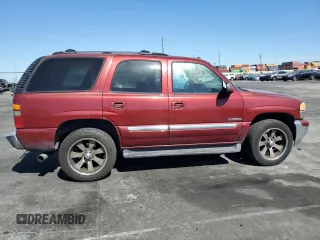 2003 GMC Yukon SLT z VIN 1GKEC13T53J319647, wystawiony jako Copart lot #49014225 z przebiegiem 298 601 mil mil oraz Czysty tytuł • Clean title. Historia ofert i sprzedaży dostępna na DreamBid. Obrazek 3.