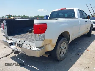 2010 Toyota Tundra SR with VIN 5TFTY5F19AX006696, listed as a IAAI auction lot 42379570 with 332,246 mi miles and . Bid and sale history available at DreamBid. Image 4.