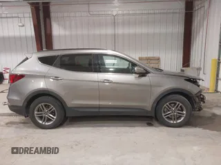 2017 Hyundai Santa Fe 2.4L z VIN 5XYZUDLBXHG447389, wystawiony jako IAAI lot #42249551 z przebiegiem 178 084 mil mil oraz . Historia ofert i sprzedaży dostępna na DreamBid. Obrazek 14.