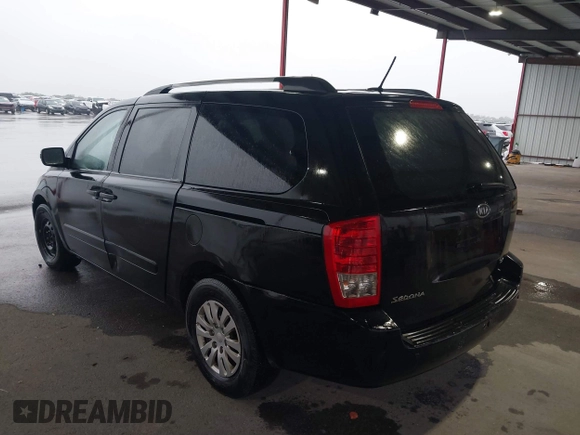 2011 Kia Sedona LX with VIN KNDMG4C71B6376011, listed as a IAAI auction lot 41600258 with 162,025 mi miles. Bid and sale history available at carsss.com. Image 3.