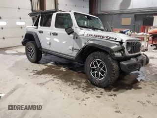 2024 Jeep Wrangler Rubicon with VIN 1C4PJXFG4RW276006, listed as a IAAI auction lot 41471304 with 9,042 mi miles. Bid and sale history available at carsss.com. Image 1.