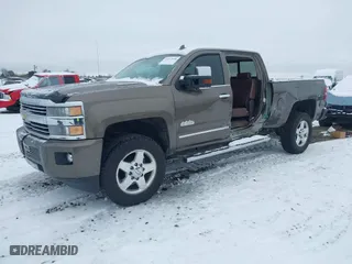 2015 Chevrolet Silverado 2500HD Built After Aug 14 High Country with VIN 1GC1KXE89FF543780, listed as a IAAI auction lot 41557608 with 164,171 mi miles. Bid and sale history available at carsss.com. Image 18.