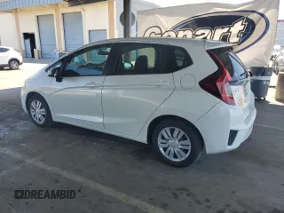 2016 Honda Fit LX with VIN JHMGK5H58GX031938, listed as a Copart auction lot 63101705 with 102,138 mi miles and Salvage title. Bid and sale history available at DreamBid. Image 2.
