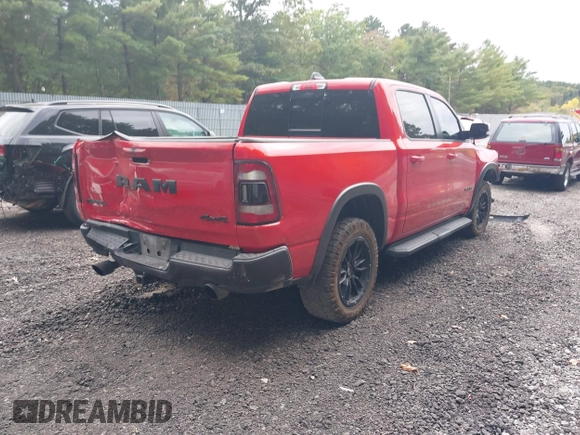 2021 Ram 1500 Rebel with VIN 1C6SRFLT2MN591844, listed as a IAAI auction lot 40410248 with 84,759 mi miles and . Bid and sale history available at DreamBid. Image 4.