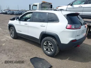 2019 Jeep Cherokee Trailhawk Elite with VIN 1C4PJMBX4KD351261, listed as a IAAI auction lot 41944727 with 97,849 mi miles. Bid and sale history available at carsss.com. Image 3.