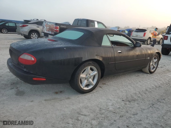 1997 Jaguar XK8 with VIN SAJGX2746VC005015, listed as a Copart auction lot 76176284 with 0 mi miles and Non Repairable. Bid and sale history available at carsss.com. Image 3.