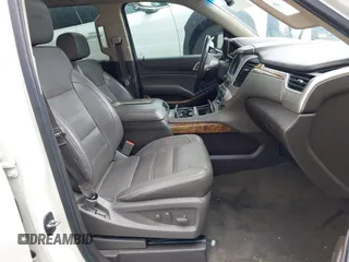 2015 GMC Yukon XL Denali with VIN 1GKS2JKJ2FR590502, listed as a IAAI auction lot 41758575 with 129,777 mi miles. Bid and sale history available at carsss.com. Image 5.