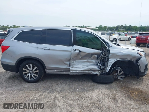 2021 Honda Pilot EX z VIN 5FNYF5H3XMB030112, wystawiony jako IAAI lot #42204148 z przebiegiem 96 182 mil mil oraz . Historia ofert i sprzedaży dostępna na DreamBid. Obrazek 14.