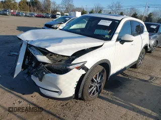 2018 Mazda CX-5 S Premium with VIN JM3KFBDM8J1419006, listed as a IAAI auction lot 41498658 with 123,622 mi miles and . Bid and sale history available at DreamBid. Image 18.