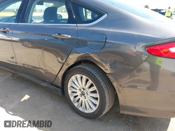 2016 Ford Fusion SE Hybrid with VIN 3FA6P0LU9GR405097, listed as a IAAI auction lot 42000535 with 58,293 mi miles. Bid and sale history available at carsss.com. Image 6.