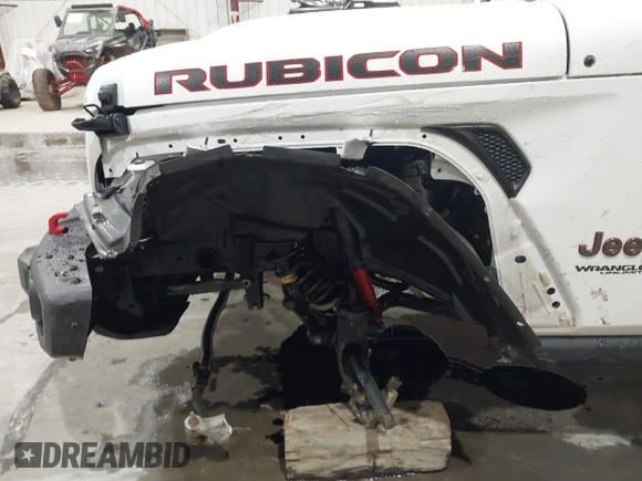 2021 Jeep Wrangler Unlimited Rubicon with VIN 1C4HJXFN2MW809904, listed as a IAAI auction lot 41567956 with 34,000 mi miles and . Bid and sale history available at DreamBid. Image 6.