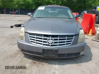 2007 Cadillac DTS Luxury I z VIN 1G6KD57Y37U116319, wystawiony jako IAAI lot #42401901 z przebiegiem 109 737 mil mil oraz . Historia ofert i sprzedaży dostępna na DreamBid. Obrazek 6.