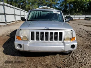 2006 Jeep Commander with VIN 1J8HH48N96C212639, listed as a Copart auction lot 73800324 with 140,579 mi miles and Salvage Title. Bid and sale history available at carsss.com. Image 5.