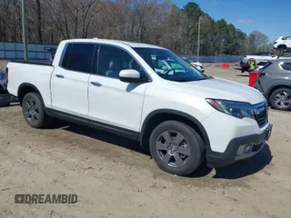 2020 Honda Ridgeline RTL-E with VIN 5FPYK3F75LB000317, listed as a IAAI auction lot 41850029 with 17,430 mi miles and . Bid and sale history available at DreamBid. Image 1.
