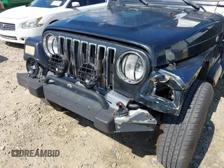 1998 Jeep Wrangler SE with VIN 1J4FY29P5WP793305, listed as a IAAI auction lot 42653372 with 190,047 mi miles and . Bid and sale history available at DreamBid. Image 6.
