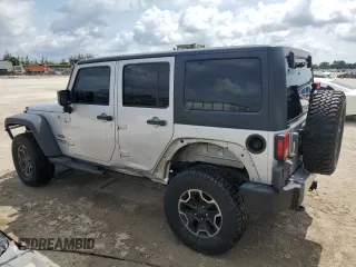 2012 Jeep Wrangler Unlimited Sport z VIN 1C4BJWDG8CL220960, wystawiony jako Copart lot #57823315 z przebiegiem 177 541 mil mil oraz Szkoda całkowita • Salvage title. Historia ofert i sprzedaży dostępna na DreamBid. Obrazek 2.