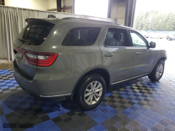 2022 Dodge Durango SXT with VIN 1C4RDJAG6NC228393, listed as a Copart auction lot 45931365 with 58,078 mi miles and Clean Title. Bid and sale history available at carsss.com. Image 3.