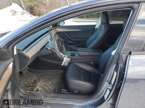 2023 Tesla Model 3 with VIN 5YJ3E1EA7PF496089, listed as a Copart auction lot 87101254 with 42,830 mi miles and Salvage Title. Bid and sale history available at DreamBid. Image 7.