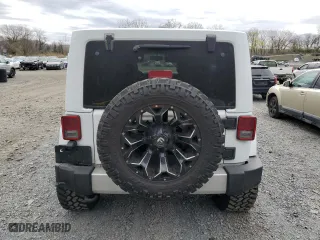 2014 Jeep Wrangler Unlimited Sahara with VIN 1C4HJWEG1EL320667, listed as a Copart auction lot 53719395 with 144,802 mi miles and Clean Title. Bid and sale history available at carsss.com. Image 6.