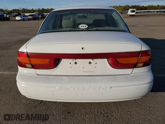 2001 Saturn SL z VIN 1G8ZK52771Z219294, wystawiony jako Copart lot #83155494 z przebiegiem 190 338 mil mil oraz Szkody całkowita. Historia ofert i sprzedaży dostępna na DreamBid. Obrazek 6.
