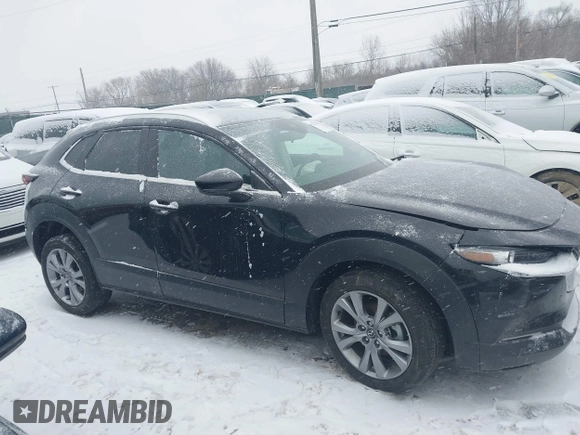 2023 Mazda CX-30 S Preferred z VIN 3MVDMBCM5PM538960, wystawiony jako IAAI lot #41273300 z przebiegiem 22 846 mil mil oraz . Historia ofert i sprzedaży dostępna na DreamBid. Obrazek 13.