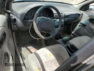 1999 Saturn SL with VIN 1G8ZF5287XZ265634, listed as a Copart auction lot 55973834 with Not Provided miles and Clean Title. Bid and sale history available at carsss.com. Image 8.