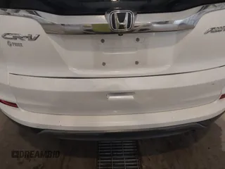 2015 Honda CR-V LX with VIN 5J6RM4H36FL005268, listed as a IAAI auction lot 42101431 with 179,411 mi miles and . Bid and sale history available at carsss.com. Image 6.