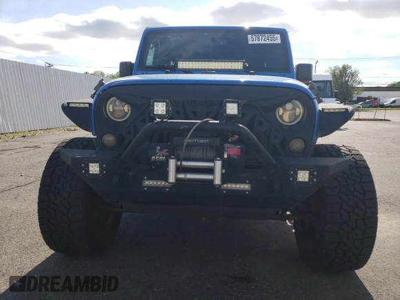 2016 Jeep Wrangler Unlimited Sport z VIN 1C4BJWDG3GL115622, wystawiony jako Copart lot #57872455 z przebiegiem 98 812 mil mil oraz Szkoda całkowita • Salvage title. Historia ofert i sprzedaży dostępna na DreamBid. Obrazek 5.