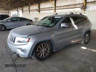 2014 Jeep Grand Cherokee Limited z VIN 1C4RJFBM9EC383983, wystawiony jako Copart lot #60193815 z przebiegiem 219 047 mil mil oraz Szkoda całkowita • Salvage title. Historia ofert i sprzedaży dostępna na DreamBid. Obrazek 1.