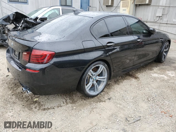 2013 BMW M5 z VIN WBSFV9C56DD096294, wystawiony jako Copart lot #57855005 z przebiegiem Nie podano mil oraz Tytuł czysty. Historia ofert i sprzedaży dostępna na DreamBid. Obrazek 3.
