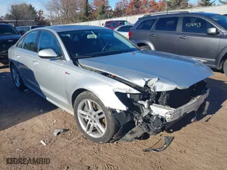 2012 Audi A6 3.0T Prestige with VIN WAUHGAFCXCN136954, listed as a IAAI auction lot 41204962 with 144,261 mi miles. Bid and sale history available at carsss.com. Image 1.