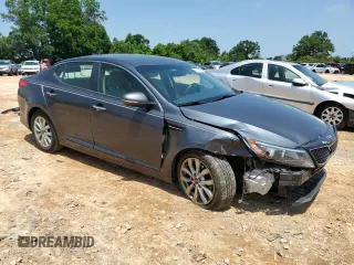 2015 Kia Optima LX z VIN KNAGM4A70F5619499, wystawiony jako Copart lot #60094465 z przebiegiem 169 373 mil mil oraz Szkoda całkowita • Salvage title. Historia ofert i sprzedaży dostępna na DreamBid. Obrazek 4.