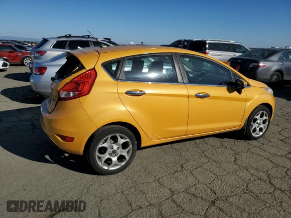 2011 Ford Fiesta SES with VIN 3FADP4FJ6BM124655, listed as a Copart auction lot 42670165 with 112,008 mi miles and Salvage Title. Bid and sale history available at carsss.com. Image 3.