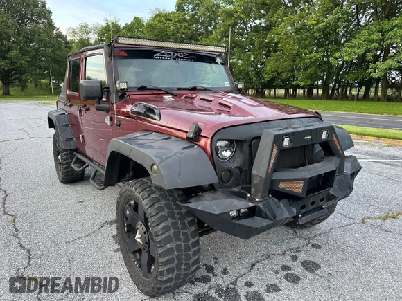 2007 Jeep Wrangler Unlimited X with VIN 1J8GA39147L156911, listed as a Copart auction lot 65987405 with 115,766 mi miles and Clean title. Bid and sale history available at DreamBid. Image 1.