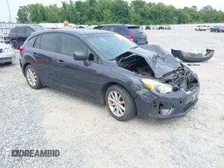 2014 Subaru Impreza Premium with VIN JF1GPAC65E8235346, listed as a IAAI auction lot 42221408 with 161,146 mi miles and . Bid and sale history available at DreamBid. Image 1.