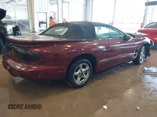 2001 Pontiac Firebird with VIN 2G2FS32K112121774, listed as a IAAI auction lot 41357815 with 1 mi miles. Bid and sale history available at carsss.com. Image 4.