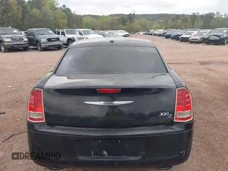 2013 Chrysler 300 with VIN 2C3CCABG4DH712280, listed as a IAAI auction lot 41471254 with 213,280 mi miles. Bid and sale history available at carsss.com. Image 17.