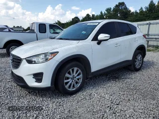 2016 Mazda CX-5 Sport with VIN JM3KE2BY1G0883830, listed as a Copart auction lot 62576825 with 103,971 mi miles and Clean title. Bid and sale history available at DreamBid. Image 1.