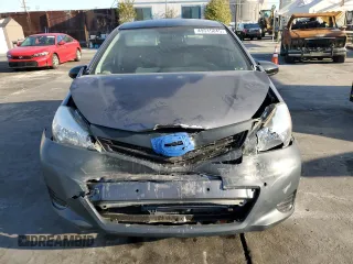 2012 Toyota Yaris L z VIN JTDKTUD33CD541021, wystawiony jako Copart lot #49515845 z przebiegiem 69 122 mil mil oraz Szkoda całkowita • Salvage title. Historia ofert i sprzedaży dostępna na DreamBid. Obrazek 5.