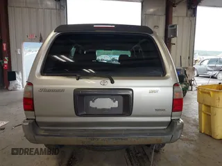 1999 Toyota 4Runner SR5 z VIN JT3HN86R8X0221532, wystawiony jako IAAI lot #41902556 z przebiegiem 406 602 mil mil oraz . Historia ofert i sprzedaży dostępna na DreamBid. Obrazek 17.
