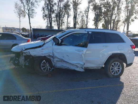 2021 Jeep Grand Cherokee Laredo X with VIN 1C4RJEAG2MC719395, listed as a IAAI auction lot 41338484 with 99,636 mi miles and . Bid and sale history available at DreamBid. Image 14.