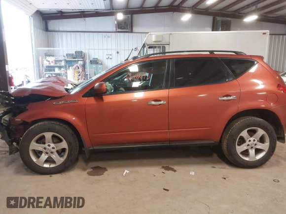 2003 Nissan Murano SL with VIN JN8AZ08W23W233886, listed as a IAAI auction lot 42000477 with 49,230 mi miles and . Bid and sale history available at DreamBid. Image 14.
