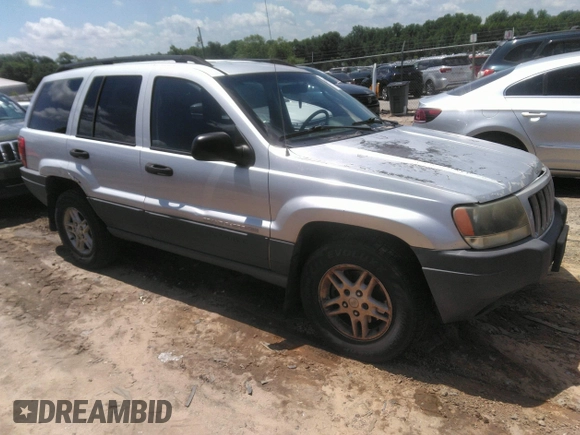 2004 Jeep Grand Cherokee Laredo z VIN 1J4GW48SX4C309998, wystawiony jako IAAI lot #42307167 z przebiegiem 306 912 mil mil oraz . Historia ofert i sprzedaży dostępna na DreamBid. Obrazek 1.