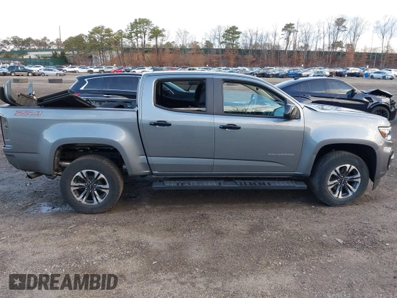 2021 Chevrolet Colorado 4WD Z71 with VIN 1GCGTDEN0M1289754, listed as a IAAI auction lot 41837440 with 30,923 mi miles and . Bid and sale history available at DreamBid. Image 13.